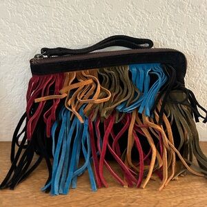 Patricia Nash wristlet multi colored fringe black suede back. Soft lining